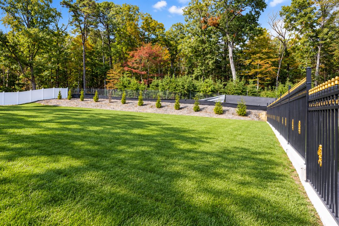 The lawn by the fence, The Main Villa